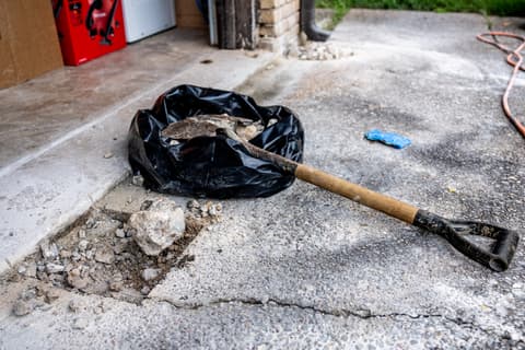 Cracks in Floor Tiles and Grout at a Quality Foundation Repair Austin inspection
