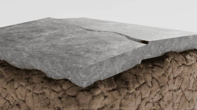Quality Foundation Repair Austin showing cracked concrete foundation due to expansive soil and settlement.