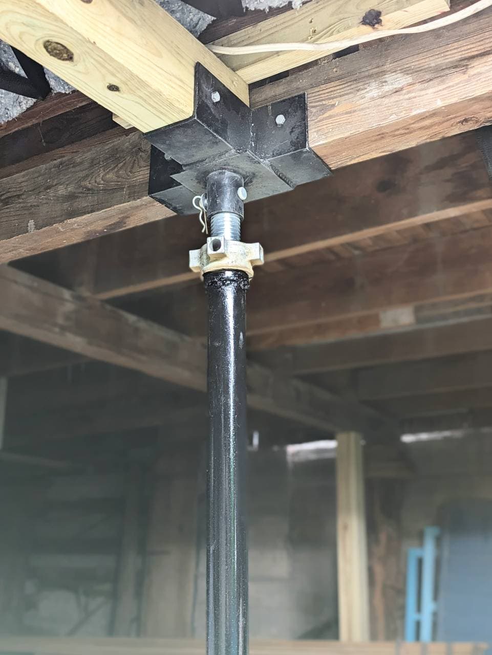 Quality Foundation Repair Austin installing a single Adjust-A-Pier to stabilize a crawl space.