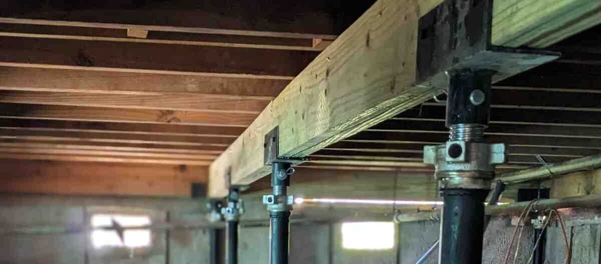 Quality Foundation Repair Austin crew installing crawl space supports under a pier and beam home.